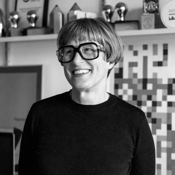 Portrait of Kate Dawkins similing in her studio